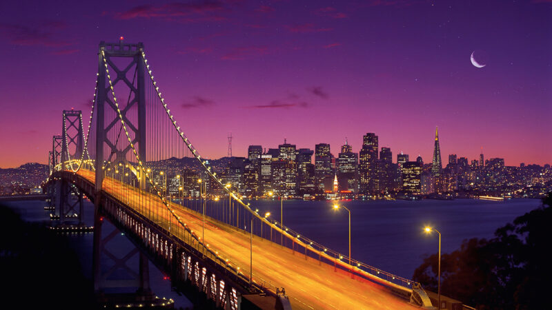 Bay Bridge Glowing Through Purple Dusk wallpaper 4K