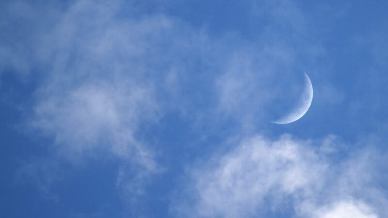 Crescent Moon Through Clouded Sky wallpaper 4K
