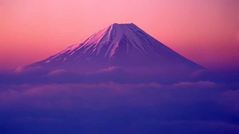 Fuji Rising Through Dawn Clouds wallpaper 4K