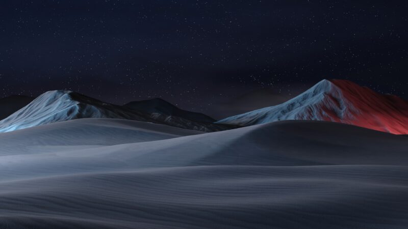 Red Glow Beyond Frozen Peaks wallpaper 4K