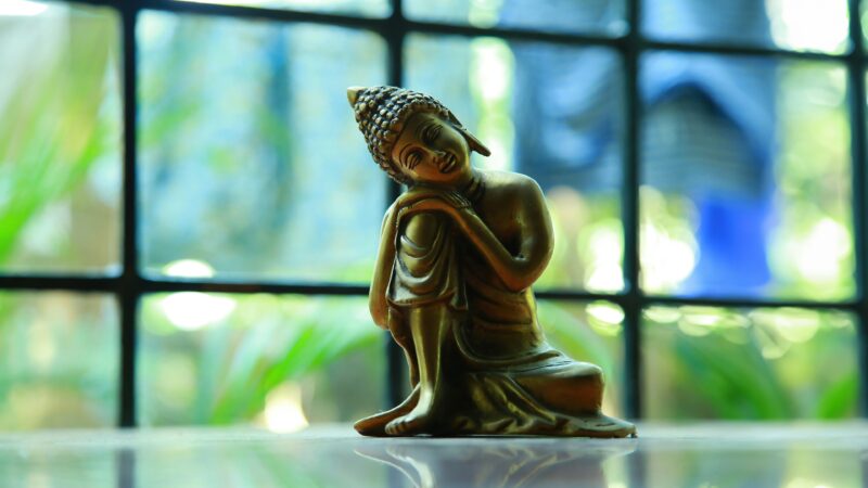 Weathered Buddha in Serene Repose wallpaper 4K