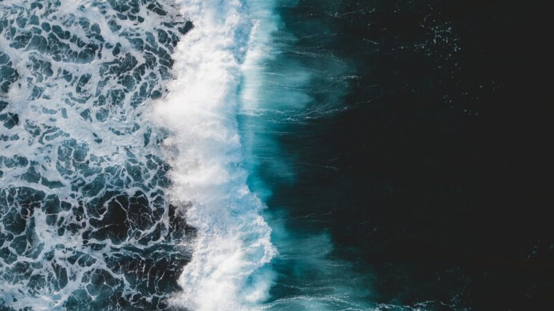 Aerial Ocean Foam vs Calm Dark Water iPhone Wallpaper 4K wallpaper 4K