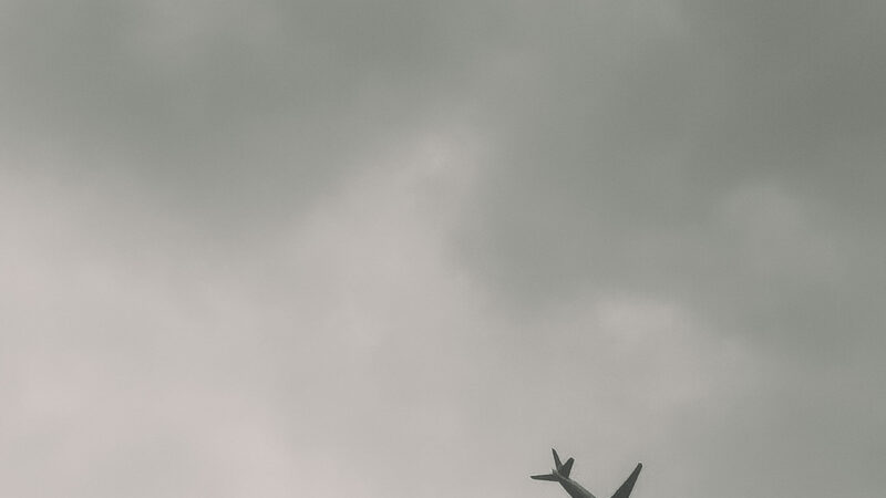 Airplane Cloudy Sky iPhone | Muted Jetliner View wallpaper 4K