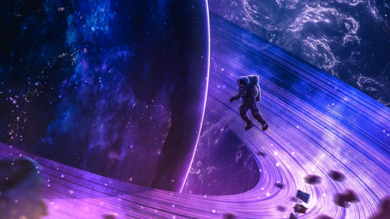 Astronaut Orbiting The Rings Of Saturn wallpaper 4K