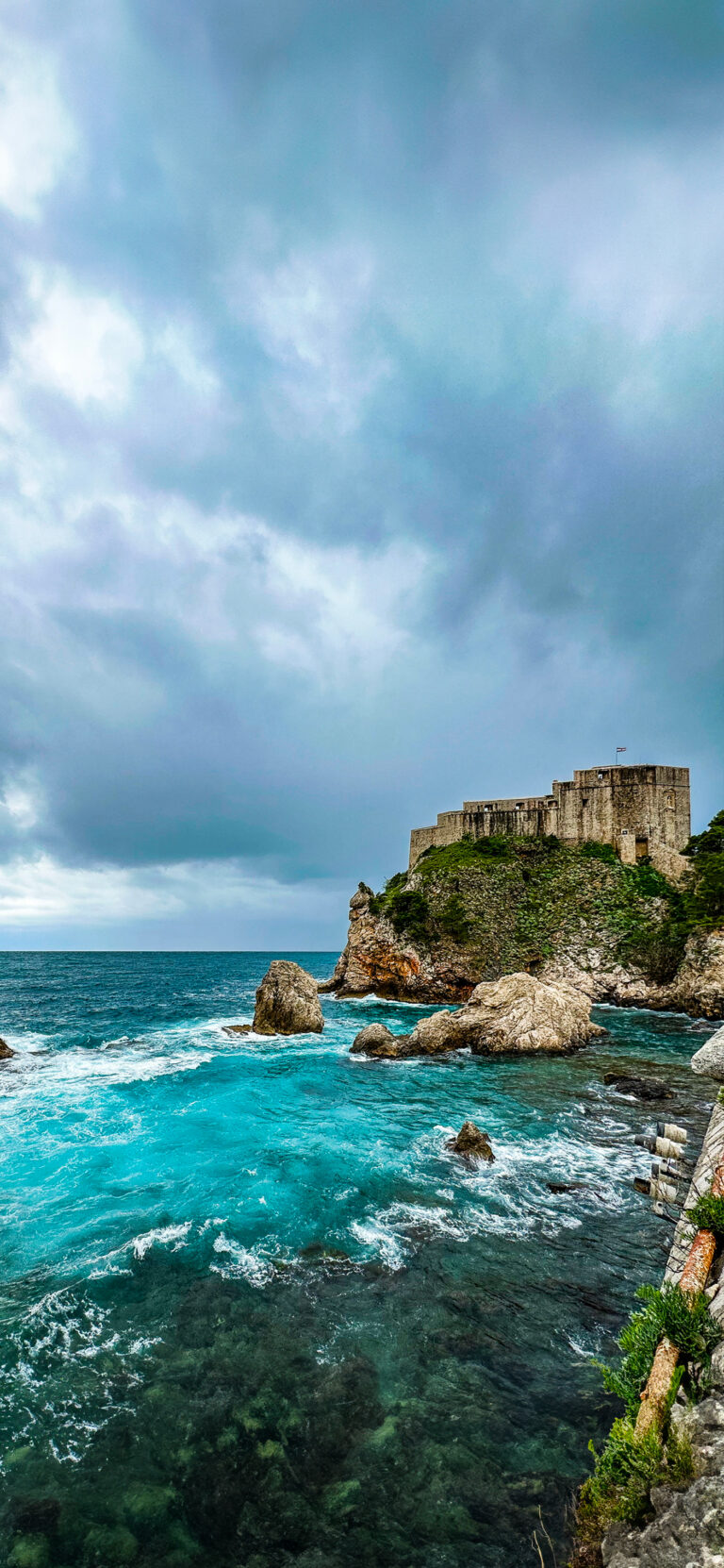 Rocky Coast Fortress iPhone | Turquoise Sea View wallpaper 4K
