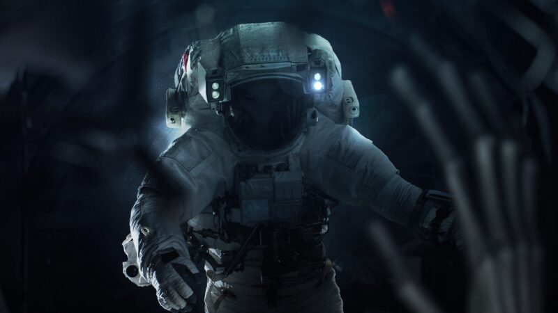 Lone Astronaut Explores the Unknown Station wallpaper 4K