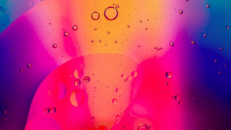 Macro Water Drops iPhone | Pink Yellow Blue Swirl wallpaper 4K