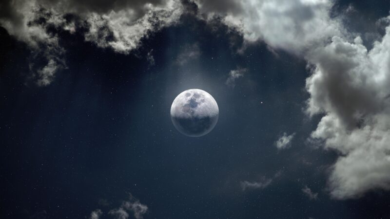 Moon Breaks Through Soft Nighttime Clouds wallpaper 4K