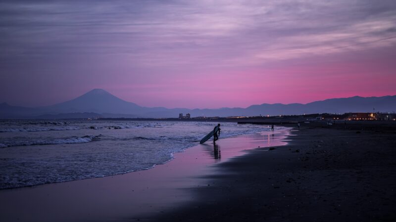 Surfer Walking on the Beach at Sunset Desktop Wallpaper 4K wallpaper 4K