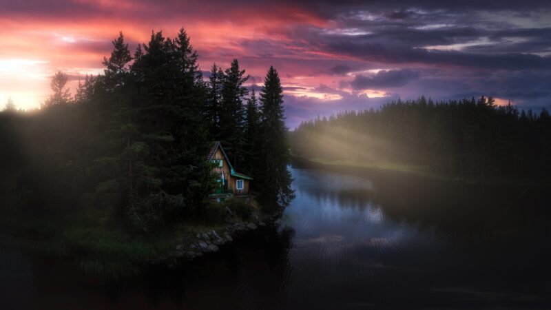 Quiet Riverside Cottage Glows at Sunset wallpaper 4K