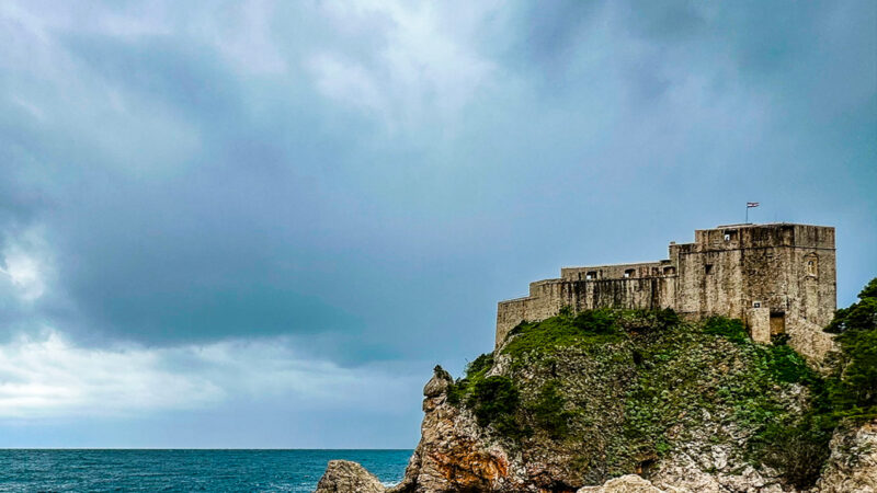 Rocky Coast Fortress iPhone | Turquoise Sea View wallpaper 4K