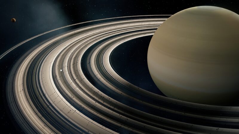 Saturn Rings Glowing Across The Solar System wallpaper 4K