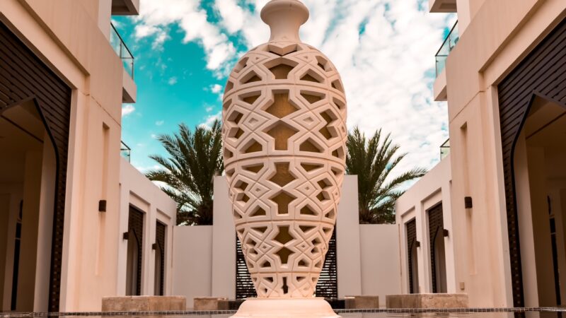 Sculpture Courtyard Reflection | Artistic Pool View iPhone wallpaper 4K