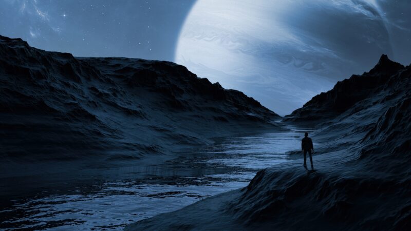 Silhouetted Man Standing Before Dreamlike Planets wallpaper 4K