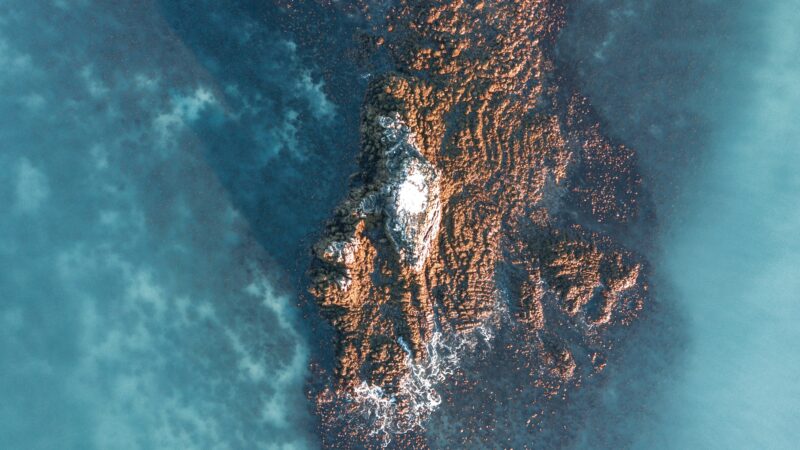 Teal Ocean Rocky Island | Aerial Coastal iPhone wallpaper 4K