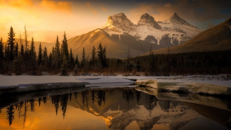 Three Sisters Glow In Winter Gold wallpaper 4K