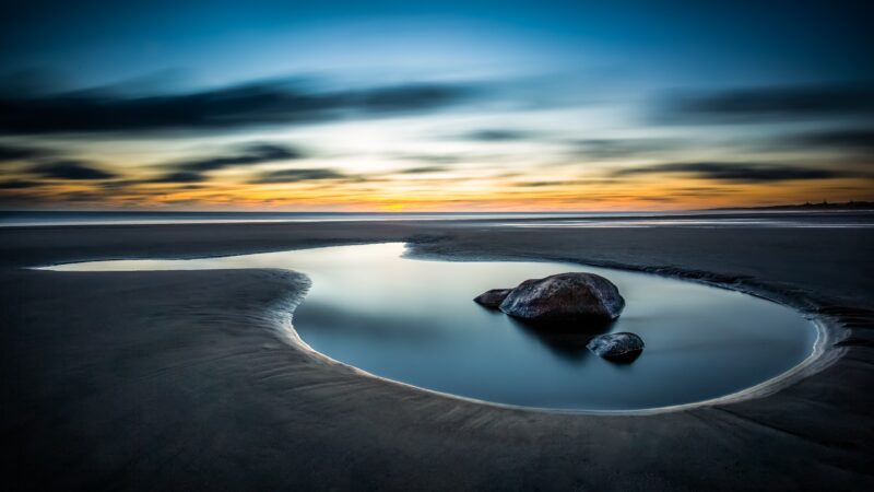Tide Pool Reflects A Coastal Sunset wallpaper 4K