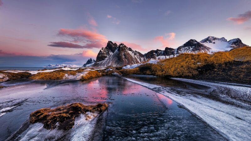 Vestrahorn Coastline Glowing at Twilight wallpaper 4K